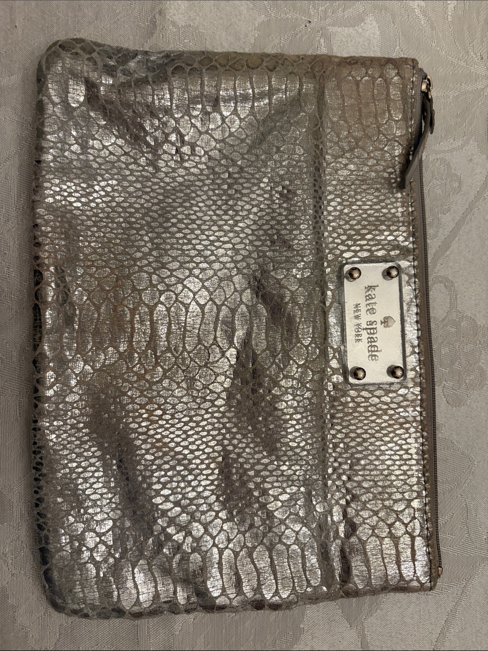 kate spade Silver Metallic Snake-Embossed Wristlet